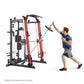 Red and black Smith machine cage system with attached weight stacks, model shown with man performing exercise using barbell a
