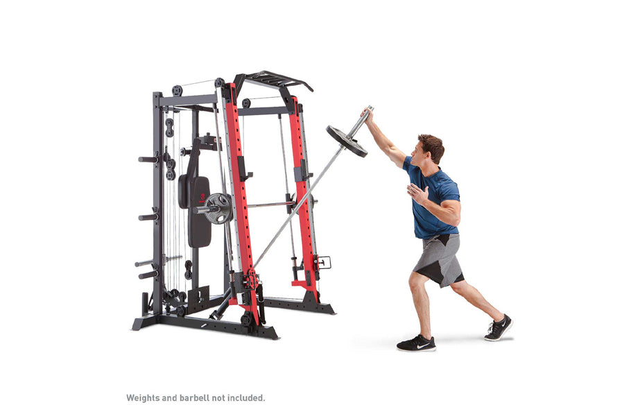Red and black Smith machine cage system with attached weight stacks, model shown with man performing exercise using barbell a