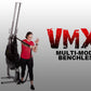 Woman in red shirt demonstrating black and silver VMX multi-mode benchless rope trainer machine on white background
