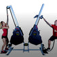 Woman in red shirt and man in red shirt using blue and black dual rope training machine with handles on white background