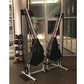 Marpo VMX rope trainer with dual black heavy bags mounted on white stand frame in gym setting