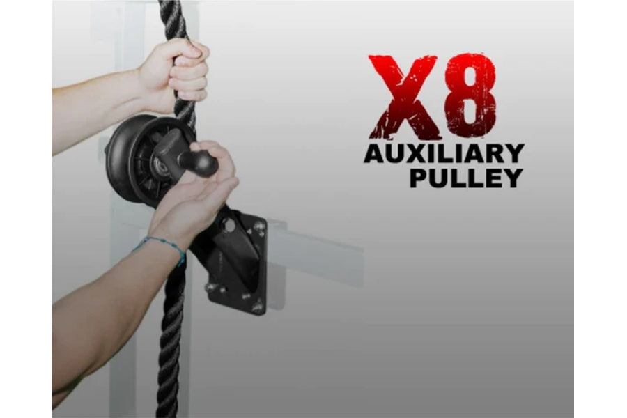 X8 auxiliary pulley with black metal bracket mounted on wall, hands gripping rope for training