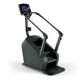 Matrix C50 Climbmill with digital display screen, black frame, and yellow accent details on footplate, shown on white backgro