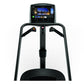 Black Matrix C50 Climbmill with digital display screen showing fitness content and dual handrails, front view on white backgr