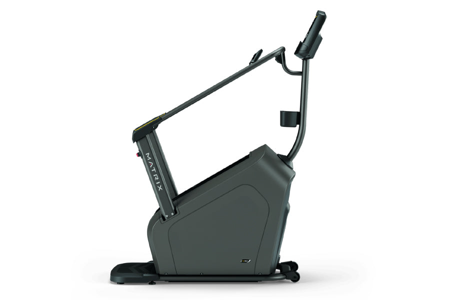 Matrix C50 Climbmill with dark gray frame, adjustable handlebars, and digital display on white background