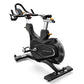 Matrix CXC indoor training bike with black seat and frame, adjustable handlebars, and foot pedals on white background