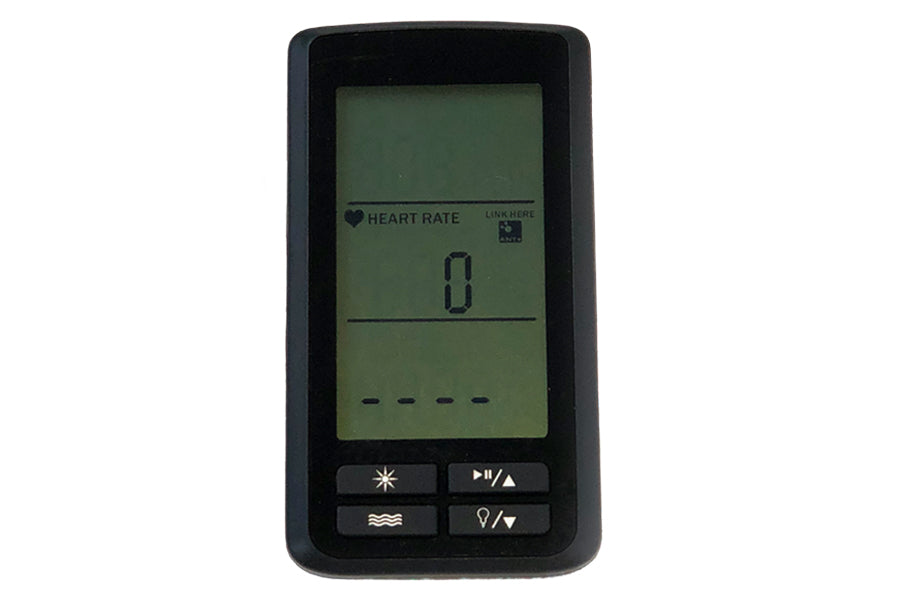 Black Matrix CXC cycling computer with green LCD display showing heart rate monitor at zero, four control buttons below scree