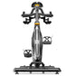 Matrix CXC indoor training bike with gray frame, black drop handlebars, and yellow accent details, shown from front view on w