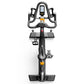Matrix CXM indoor training cycle with black frame, digital display console, curved handlebar grips, and dual platform pedals 