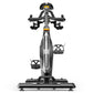 Matrix CXM Indoor Training Cycle with black frame, drop handlebars, gray seat, and platform pedals on white background, front