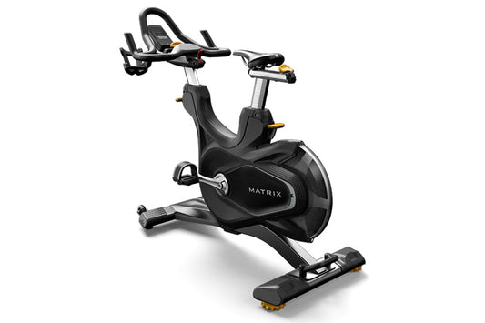 Matrix CXP black indoor training cycle with curved seat, handlebars, and yellow accents on white background
