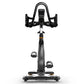 Matrix CXP indoor training cycle with black frame, curved handlebars, and foot pedals, viewed from front on white background