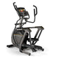 Matrix E50 elliptical machine with black and gray frame, digital console, and dual moving handlebars on white background