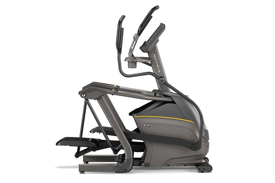 Matrix E50 elliptical machine in dark gray with yellow accent stripe and dual moving handlebars on white background