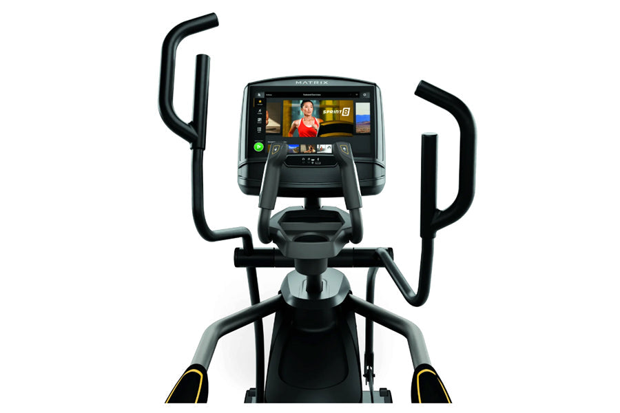 Matrix E50 elliptical machine with black frame, dual handles, and touchscreen display showing fitness content on white backgr