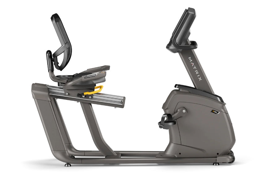 Matrix R30 recumbent exercise bike with gray frame, padded seat, handlebars, and upright display console on white background
