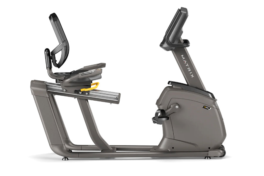 Matrix R30 recumbent exercise bike with gray frame, padded seat, curved handlebar, and upright console display on white backg
