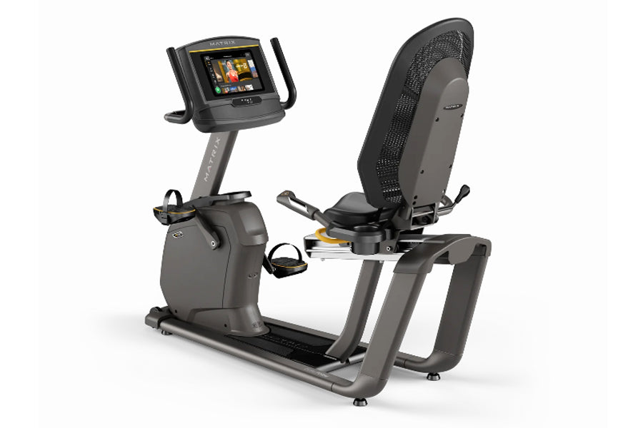 Matrix R50 recumbent exercise bike with black mesh backrest and gray frame, digital touchscreen console on adjustable arm, on