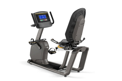 Matrix R50 recumbent exercise bike with gray frame, blue digital display console, and black mesh backrest, shown on white bac