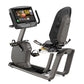 Matrix R50 recumbent exercise bike with gray frame, black mesh seat back, and touchscreen display mounted on vertical column,