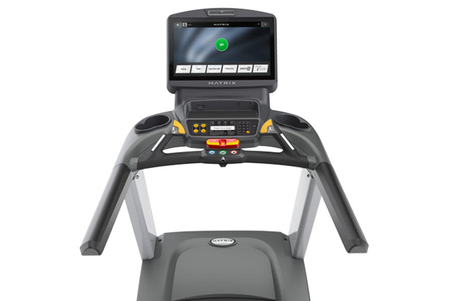 Matrix T130 treadmill with black and gray frame, digital display console with green indicator light, and control panel with y
