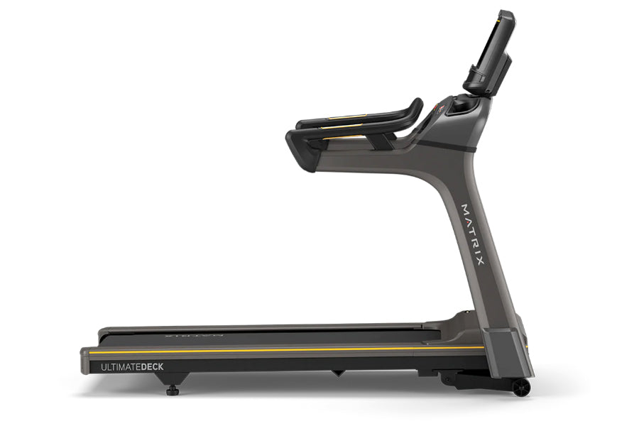 Matrix T30 treadmill with black frame, digital display console, and gold accent trim on white background