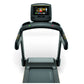 Matrix T30 treadmill with black frame, gray running deck, dual handles, and touchscreen display mounted on console, front vie