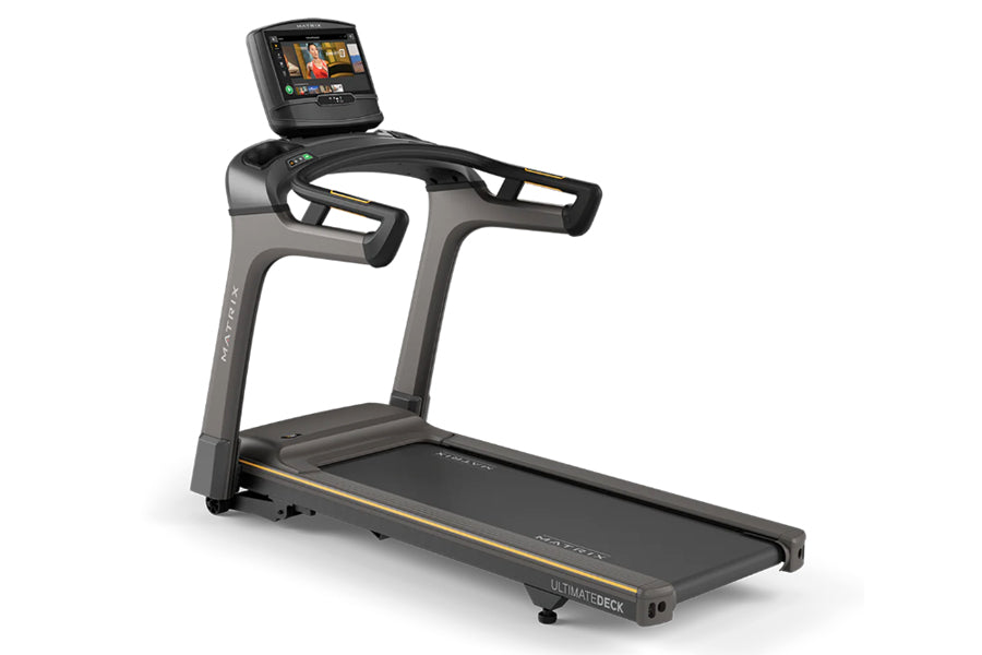 Matrix T30 treadmill with black and gray frame, digital display console, and gold accents on white background