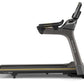 Matrix T30 treadmill with black and gray frame, digital console, and adjustable incline, shown from the side on white backgro