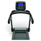 Black Matrix treadmill with digital blue display console, handrails, and running belt viewed from front on white background