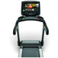Matrix T50 treadmill with black frame, dual handles, and digital touchscreen display showing workout interface on white backg
