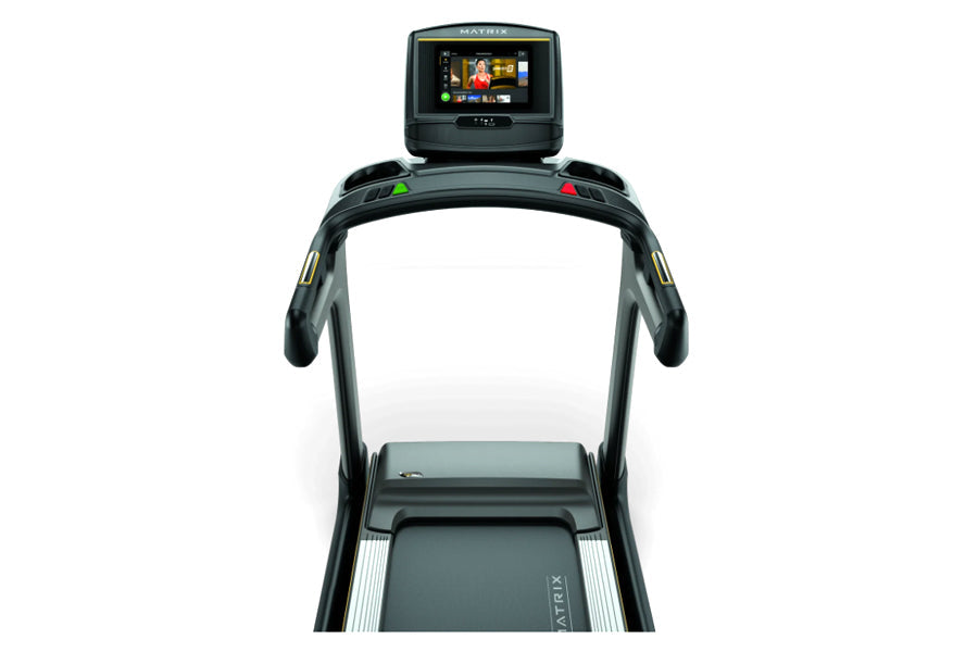 Matrix TF50 folding treadmill with black frame, digital console display, and gray running deck on white background