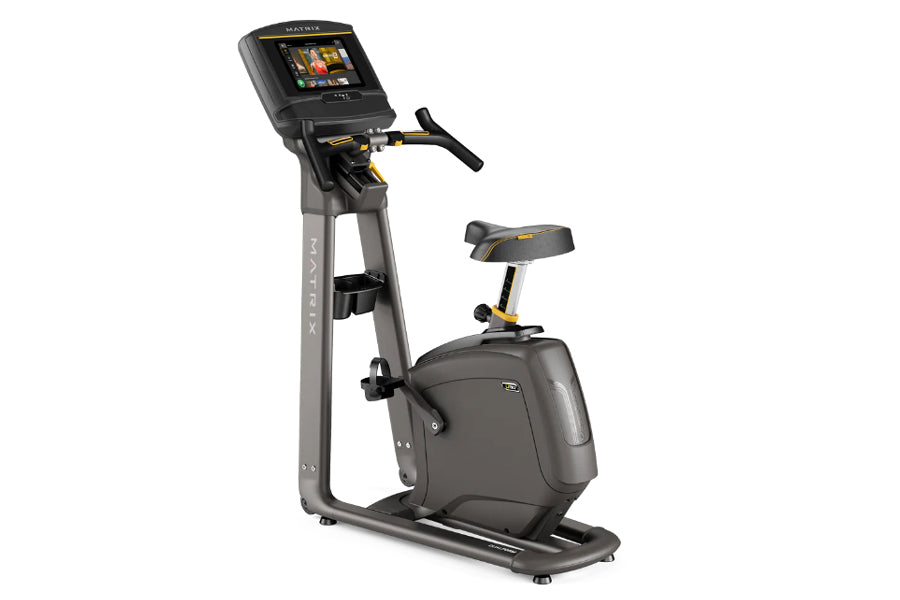 Matrix U30 upright exercise bike with black and gray frame, digital touchscreen display, and padded seat, on white background