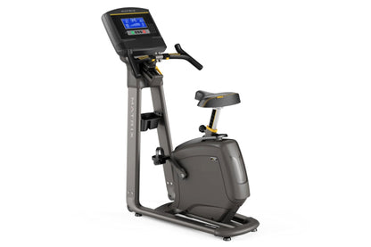 Matrix U30 upright exercise bike with black frame, digital console display, handlebars, and padded seat on white background