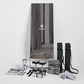 Lululemon Studio Mirror with black carrying cases, yoga mats, water bottle, towels, and accessories displayed on white backgr