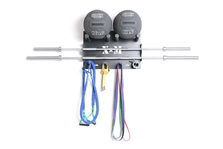 Black wall-mounted weight storage rack with two gray dumbbells, steel barbell bars, and colorful resistance bands hanging fro