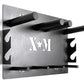 Wall-mounted weight plate storage rack in gray and black metal with multiple cylindrical pegs and "KAM" branding, flat lay vi