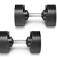 Pair of black NÜOBELL adjustable dumbbells with silver handles and weight plates, shown on white background