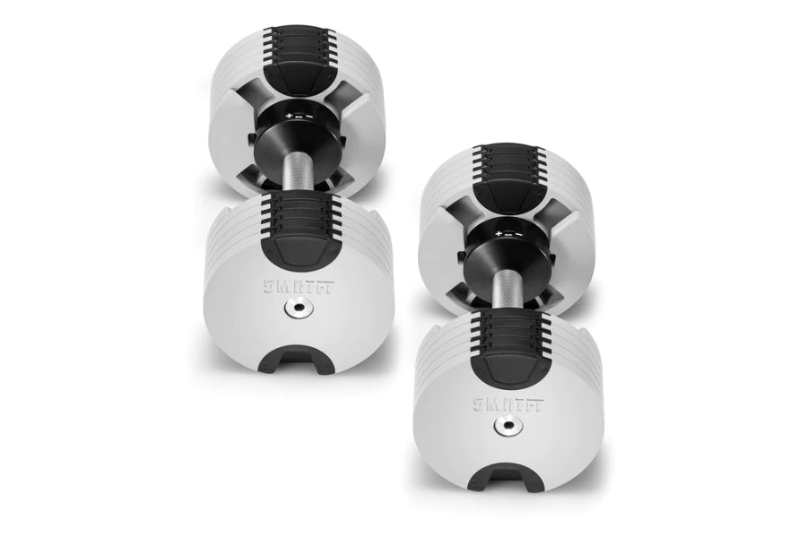 Pair of white and black adjustable dumbbells with weight adjustment dial and metal handle, shown on white background
