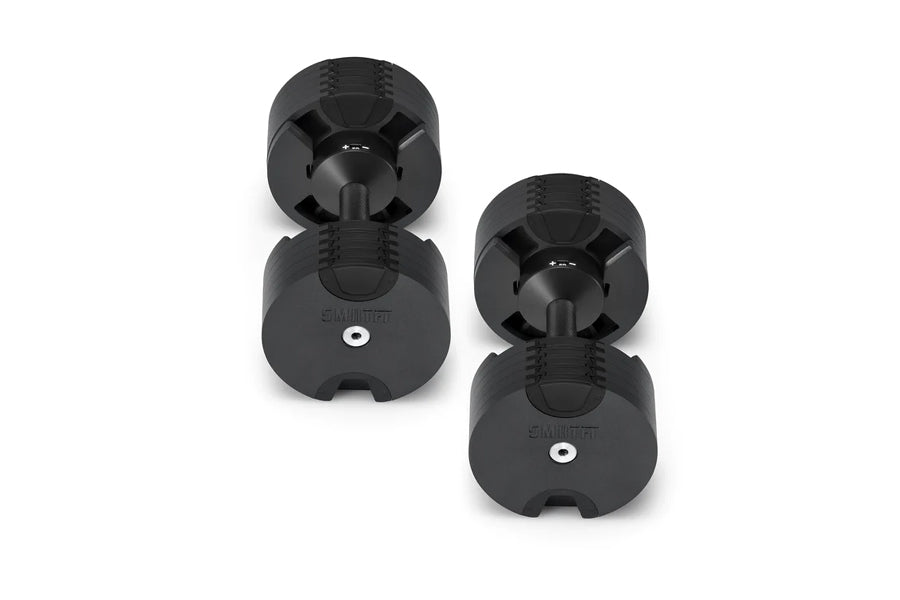 Pair of matte black adjustable dumbbells with hexagonal heads and adjustable weight mechanism, displayed on white background