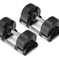 Pair of black adjustable dumbbells with chrome handles and numbered weight plates, flat lay on white background