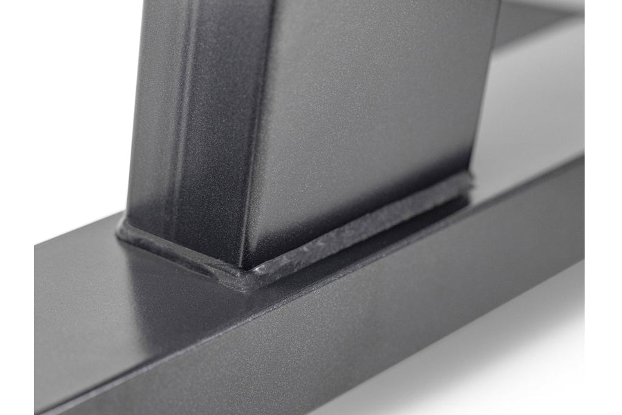 Charcoal gray steel dumbbell stand with single leg, close-up detail view showing base and support structure