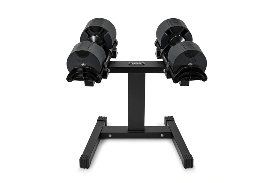 Pair of black adjustable dumbbells on single-legged stand, flat lay on white background