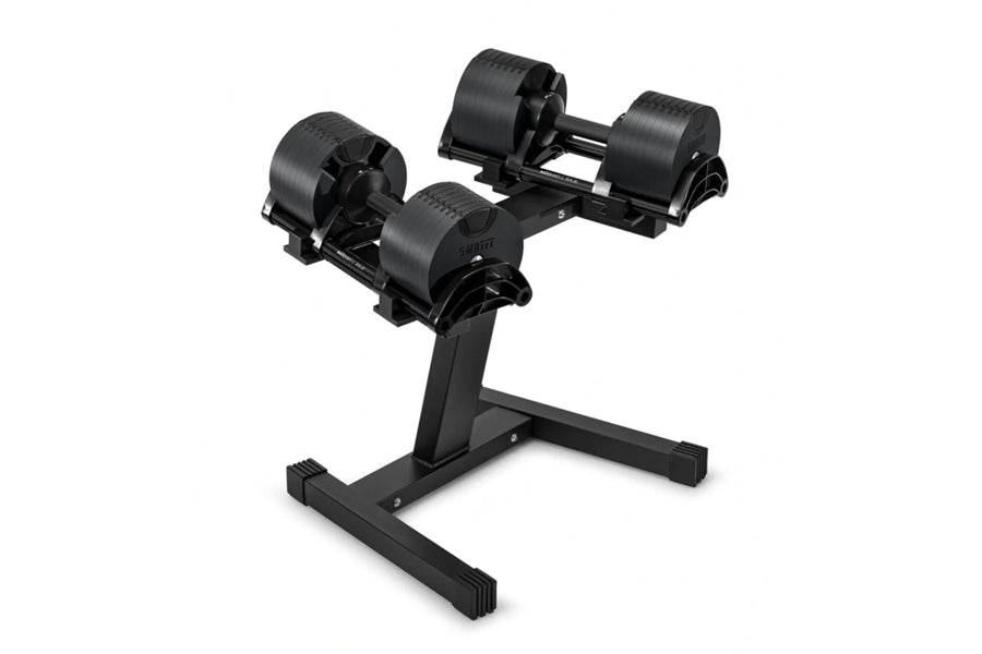 Black adjustable dumbbell stand with single leg base, featuring two weight plates on adjustable arms, on white background