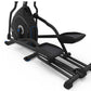 Black elliptical machine with blue accents, dual foot pedals, handle bars, and digital console on white background