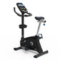 Nautilus U618 upright exercise bike with black frame, digital console, curved handlebar, and blue accent pedals on white back
