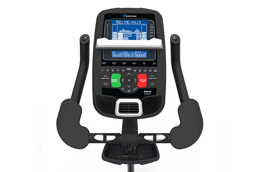 Nautilus U618 upright exercise bike with black frame, digital display screen showing Rolling Hills program, green Start and r