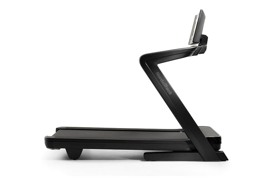Black NordicTrack 1750 commercial treadmill with digital display console and adjustable incline, shown on white background
