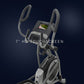 NordicTrack commercial elliptical machine with 7-inch HD touchscreen, dual handle arms, and gray frame on dark background