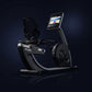 Black and gray NordicTrack Commercial R35 recumbent exercise bike with digital touchscreen display and adjustable fan on dark